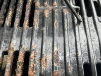 BEFORE - Closeup of rusty grate.JPEG