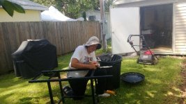 Closeup of Jon restoring grill.jpg
