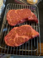 Rib Eyes dried off and seasoned.jpeg