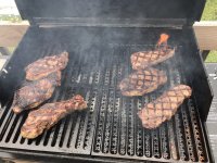 Steaks on grates flat vs narrow side up.jpeg