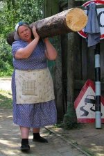 Russian woman, tree log.jpg