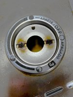 Rusted out burner knob bezel.JPG