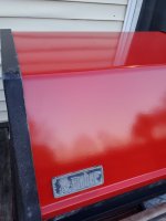 Lid cleaned og emblem.jpg Lid cleaned og emblem.jpg